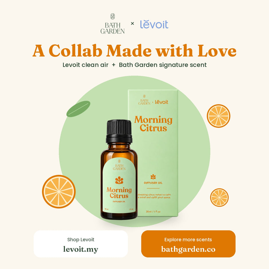 Amber diffuser oil bottle with Morning Citrus label beside green carton box.