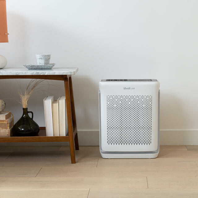 Levoit Vital 100S Smart HEPA air purifier, white front with vent grille