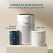 White Levoit air purifier with essential carbon and HEPA replacement filter canisters