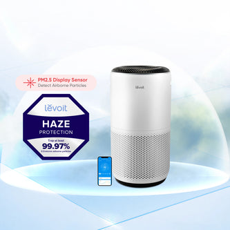 White cylindrical air purifier with perforated side vents and top air outlet