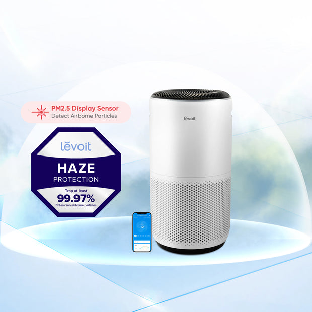White cylindrical air purifier with perforated side vents and top air outlet