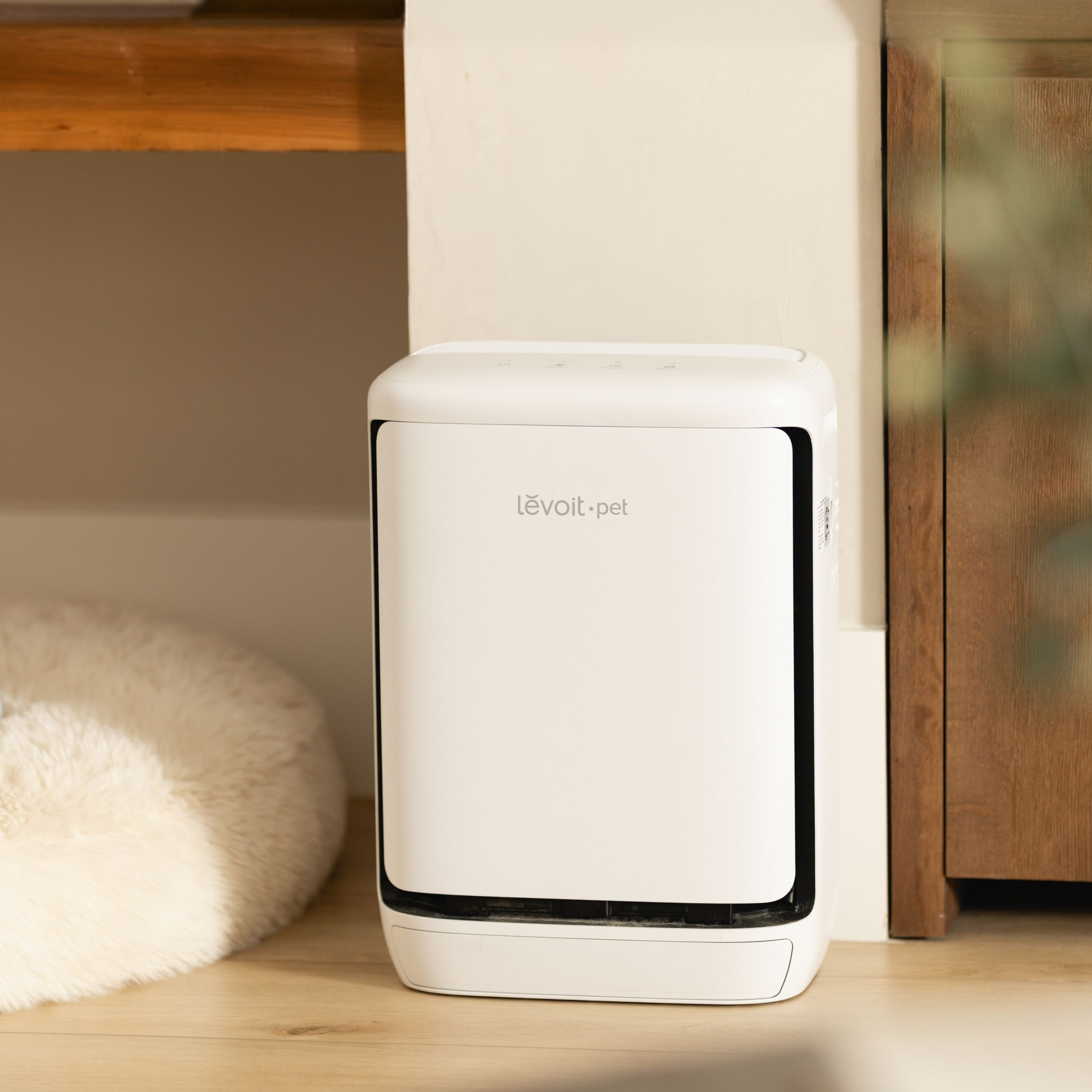 Levoit pet smart air purifier, white compact unit with front intake window