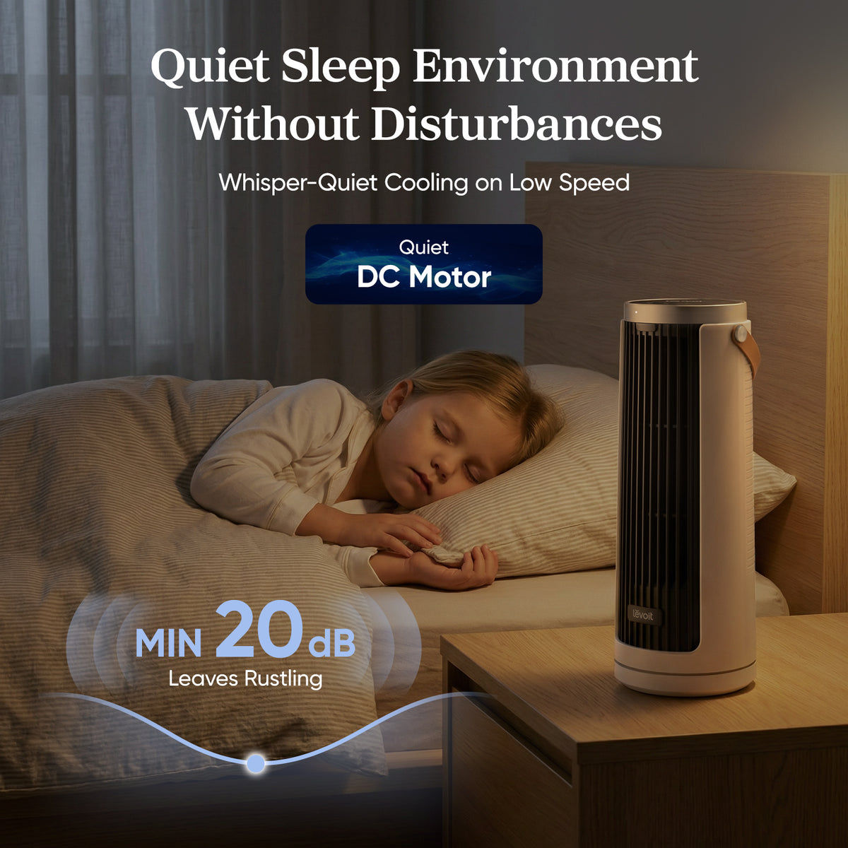 White tower fan with black grille placed on a bedside table