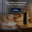White tower fan with black grille placed on a bedside table
