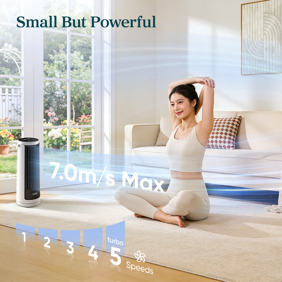 Compact white tower fan with black grille and slim vertical airflow vents